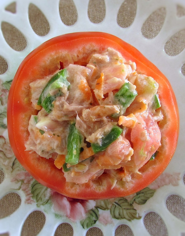 Stuffed tomatoes with tuna in a plate