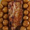 Tender Oven Baked Ribs in a glass baking dish