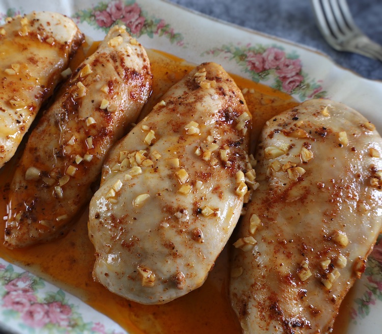 Easy baked honey garlic chicken in a rectangular platter