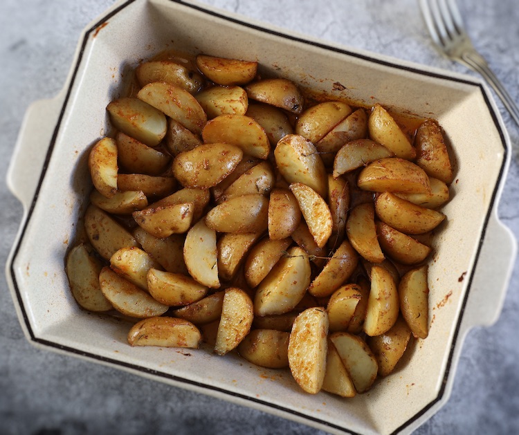 The Best Oven Roasted Potatoes on a baking dish